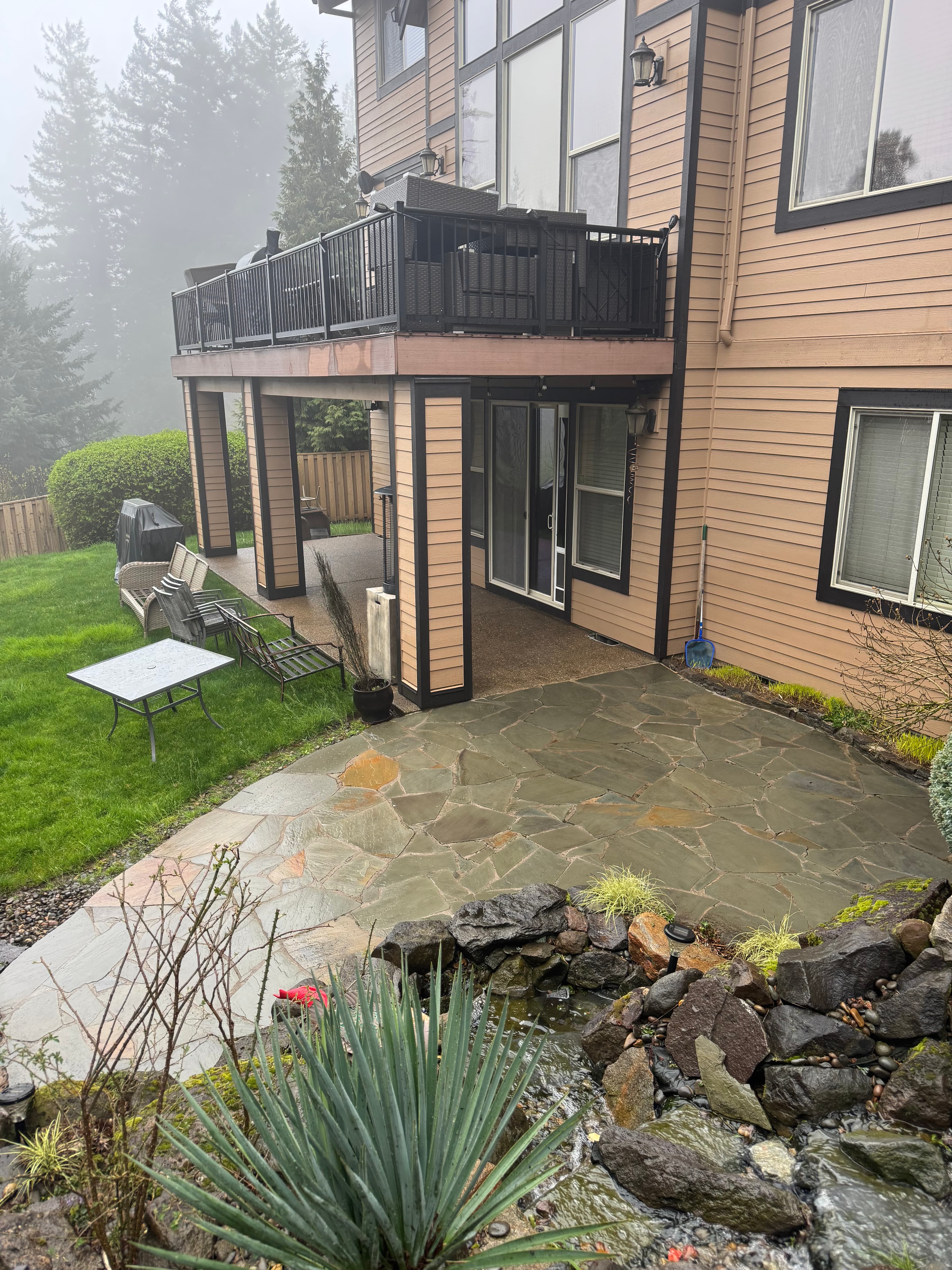 Fresh, clean concrete patio after service.